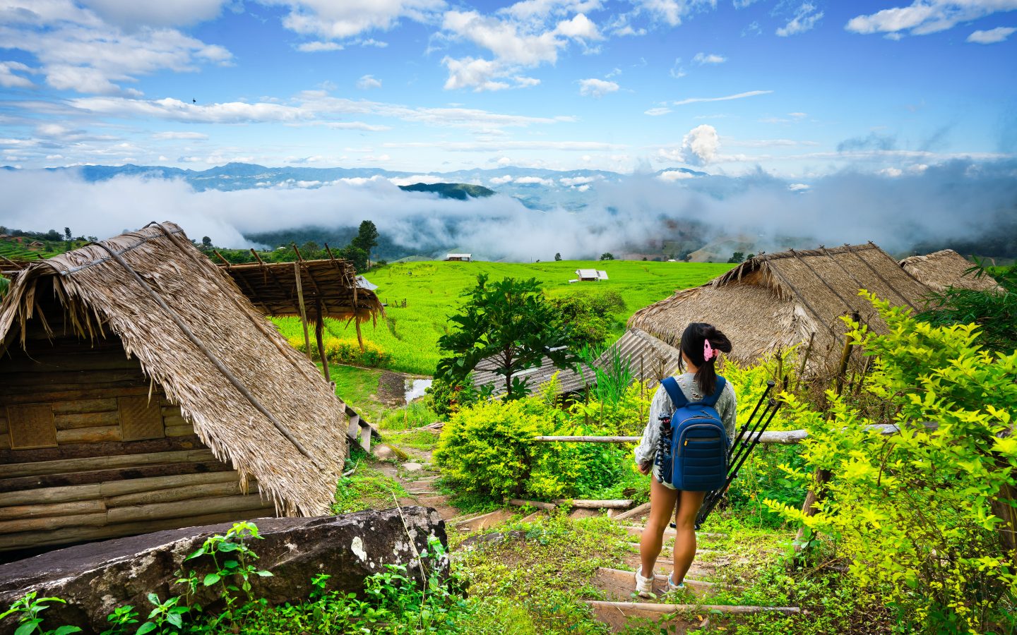 A girl standing in the rice terraces of Bali. Bali is featured in the travel books "Eat, Pray, Love"