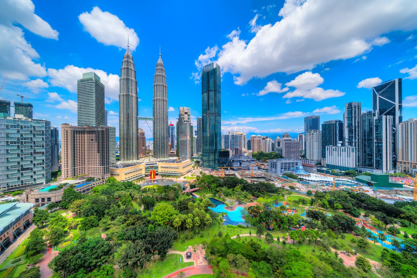 Kuala Lumpur, Malaysia with the Twin Towers and KLCC Park. Malaysia is one of the best places to visit in Asia.